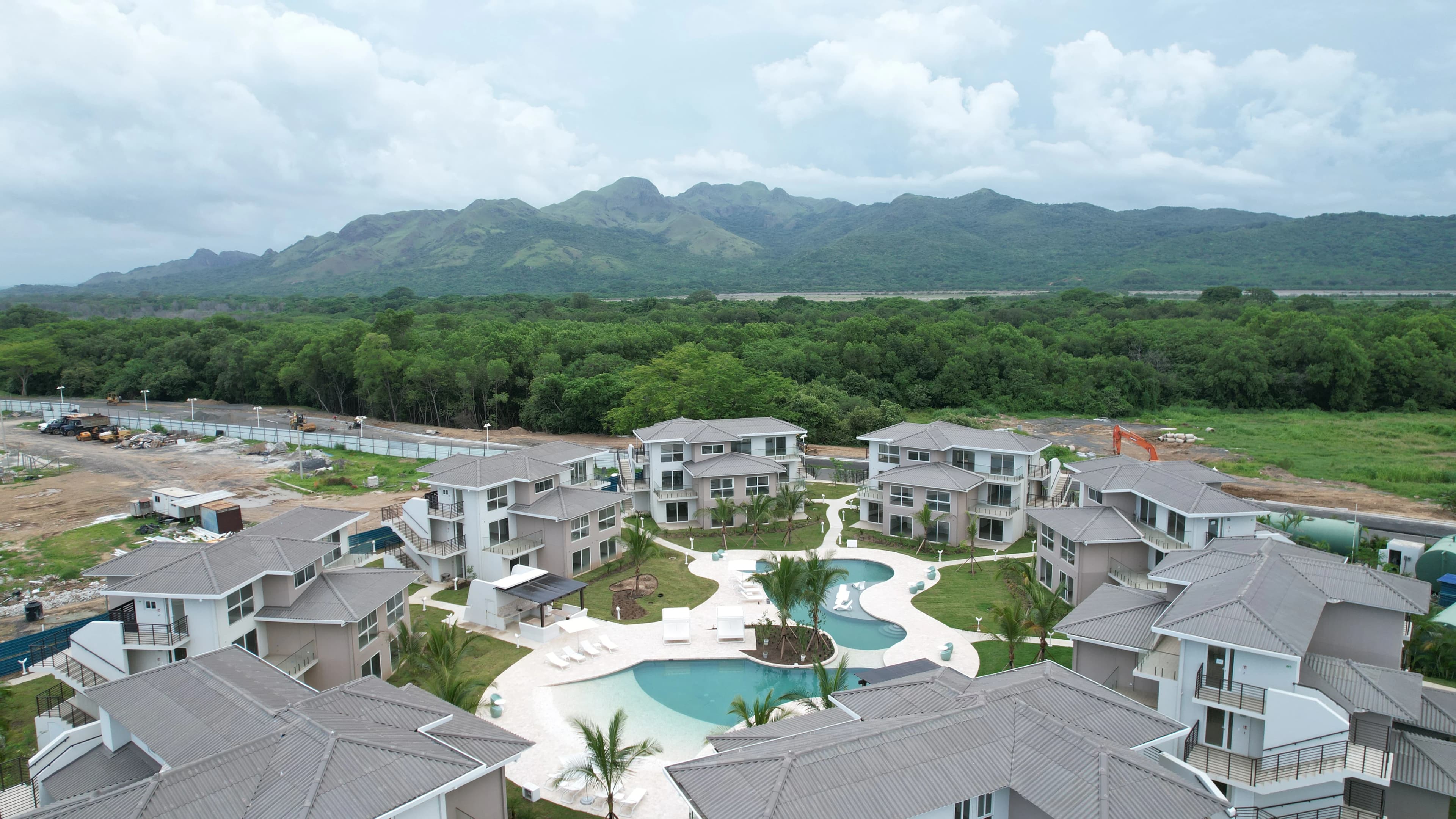 Brisas del Mar: residences arranged around pools and gardens.